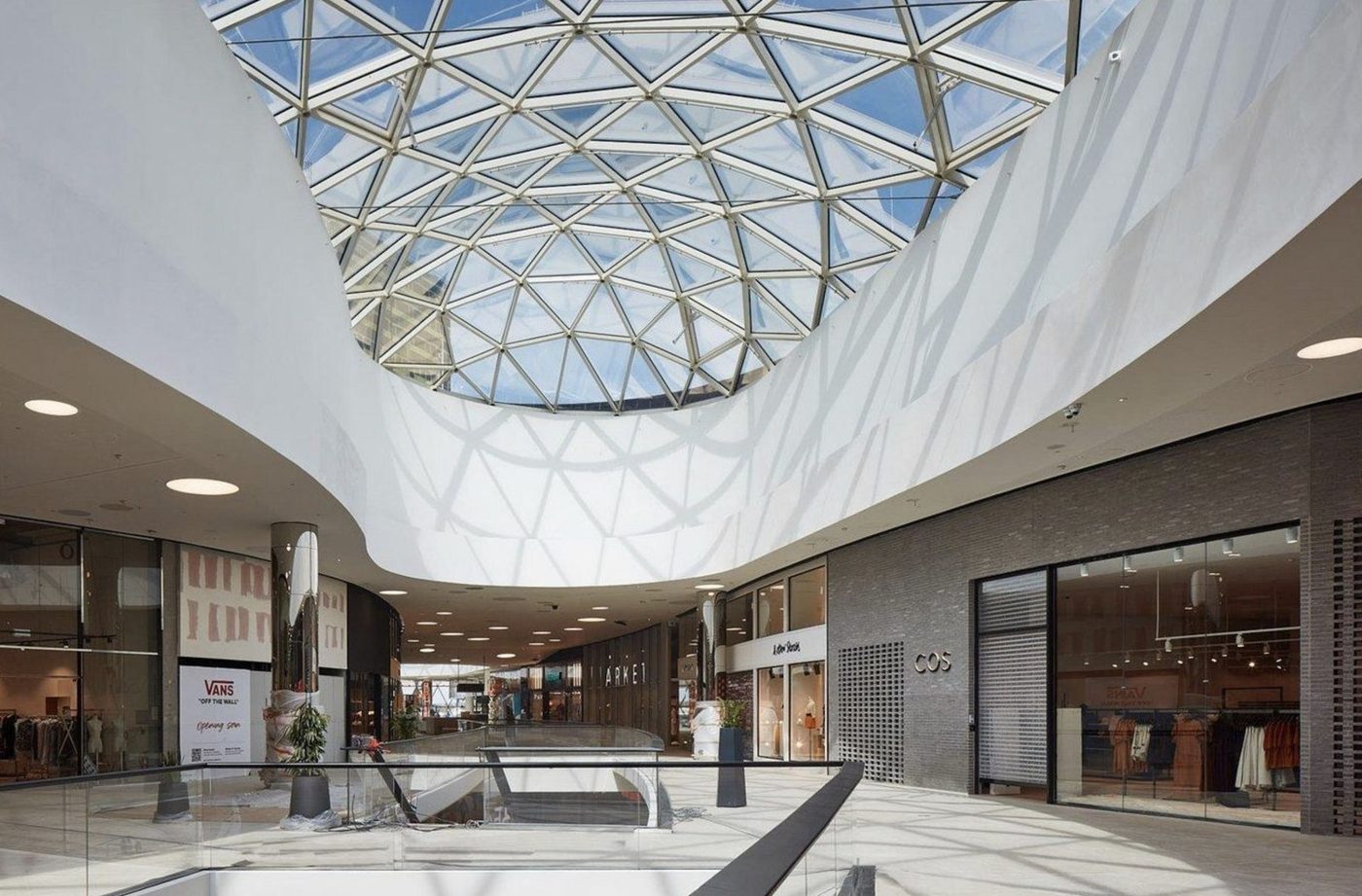 Completed shopping centre interior with glass dome